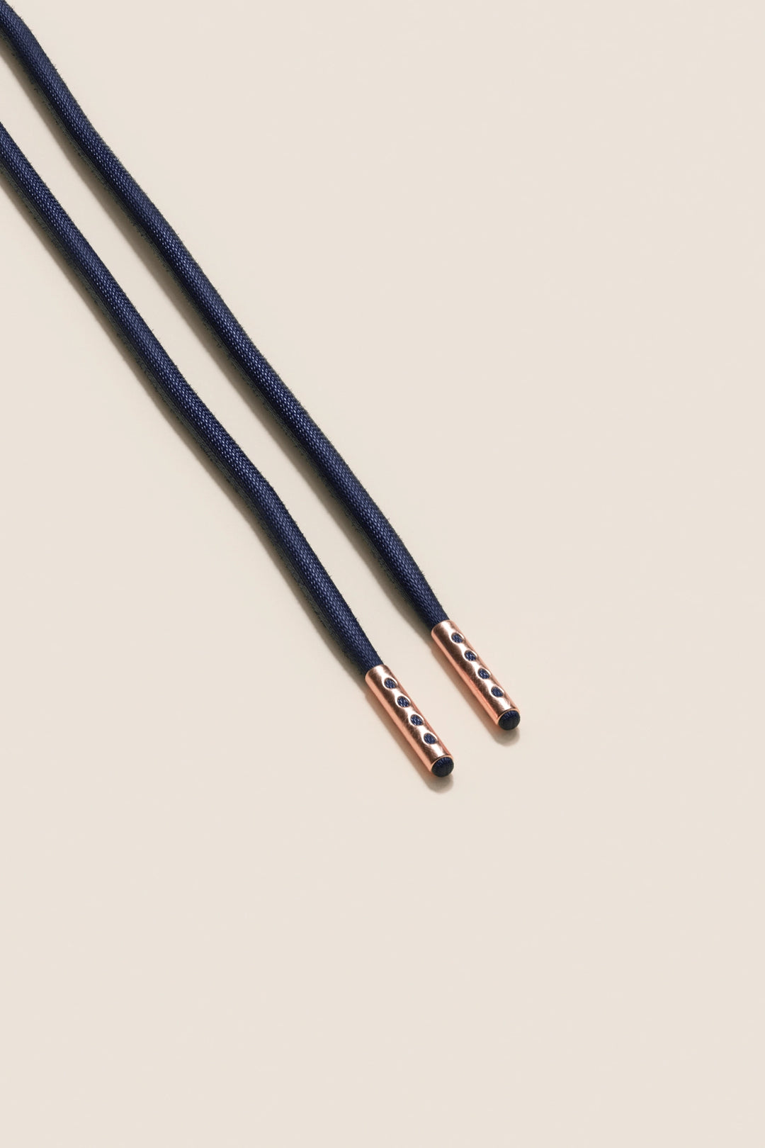 Senkels Dark Blue 4mm Round Waxed Shoelaces with Rose Gold Aglets